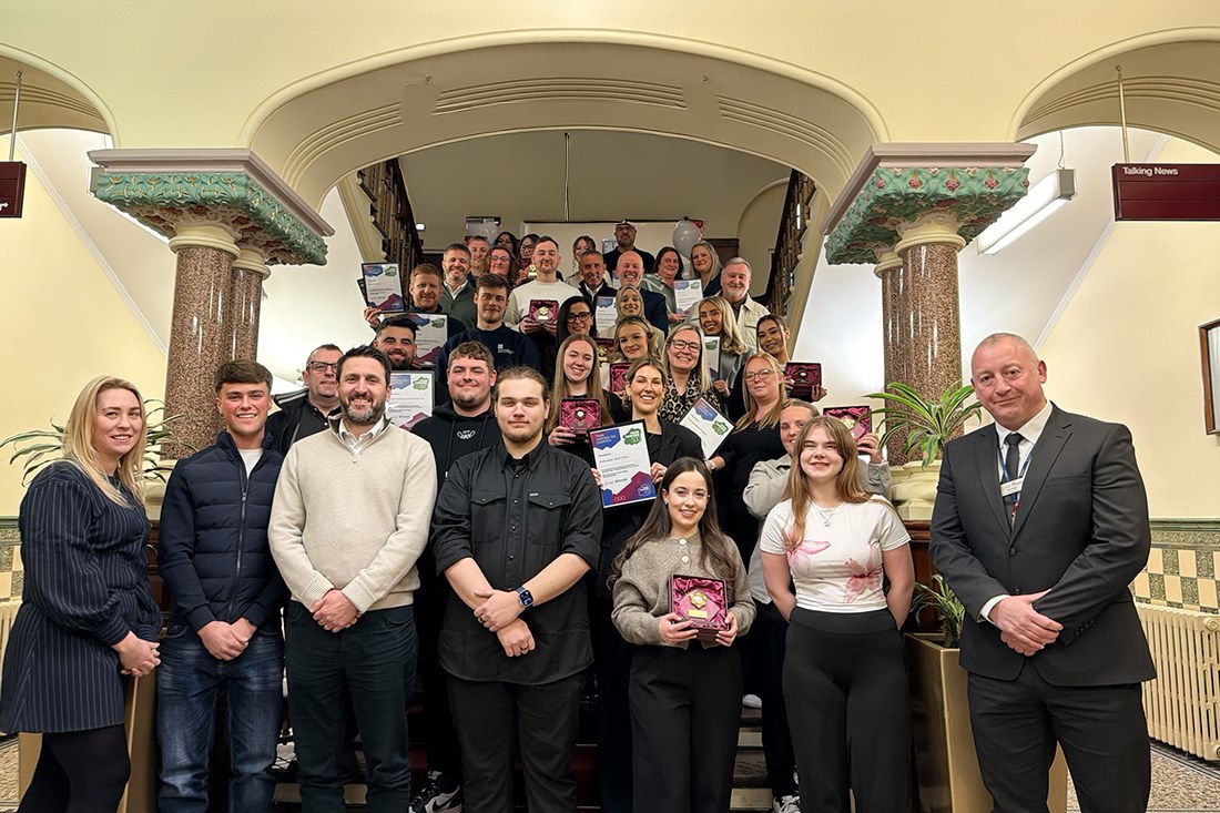Apprentices and employers gather with their awards