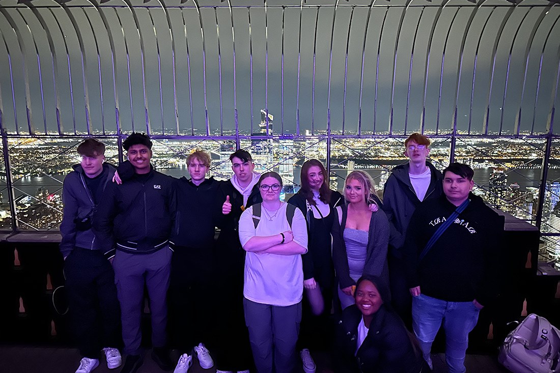 Students above New York's skyline